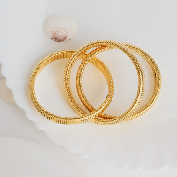 Serpentine Three Layered Golden Viper Bhumi Pednekar Bracelet